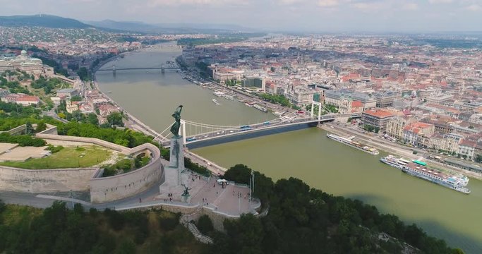 Aerial view of the Hungarian Statue of Liberty with Liberty Bridge on Danube river inBudapest,Hungary.Citadel on Gellert Hill.Freedom Statue monument

