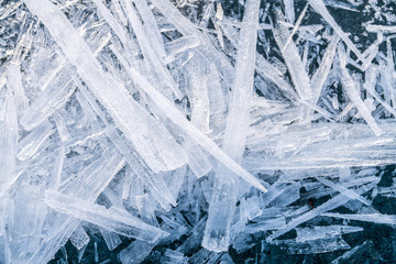 Ice sticks from water of Baikal lake for background