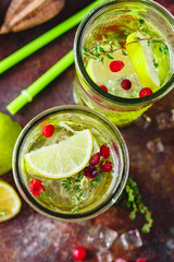 Lime Lemonade with thyme, cranberry and ice.
