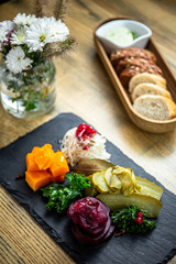 Plate of pickled vegetables with pumpkin, beetroot