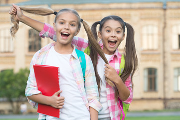 Who says growing hair cant be fun. Happy girls with long healthy hair. Beauty look of school...