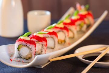 Colorful Sushi Rolls with Sake