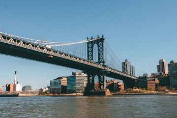 Fototapeta na wymiar New York City, NY, USA - 04/20/2019: Manhattan bridge view from boat