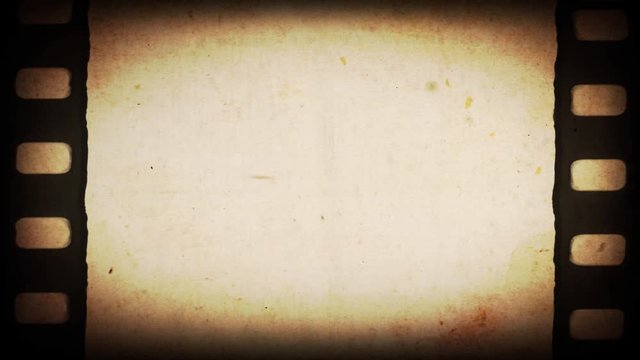 Vintage Old 35mm Filmstrip Background/ 4k animation of an old 35mm filmstrip with textures and noise effects