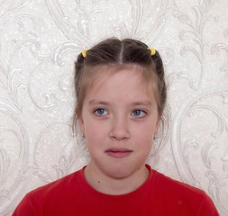 A young girl expresses a full range of emotions