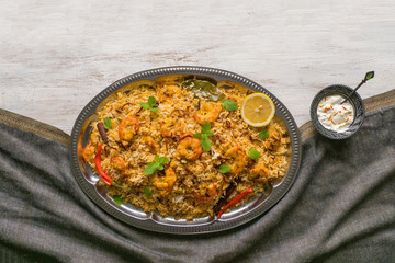 Indian Biryani with shrimp. Tasty and delicious prawns biryani, top view