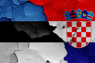 flags of Estonia and Croatia painted on cracked wall