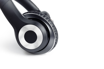 Black stylish professional wireless headphone on white background. High-quality music studio headset.