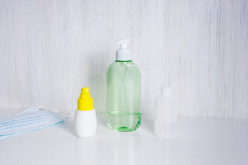 hand sanitizer gel for hand hygiene and medical surgical masks.  Preventive gear in quarantine for coronavirus. .staying home during the coronavirus pandemia.