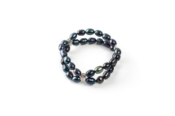 Black pearl bracelet on a white background isolate
