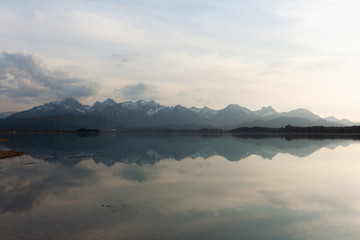 scenic view of the alps. Mountains reflecting in the water of the 