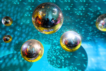 Banner with multi- colored disco balls. Template for web design. Horizontal background with mirror-...