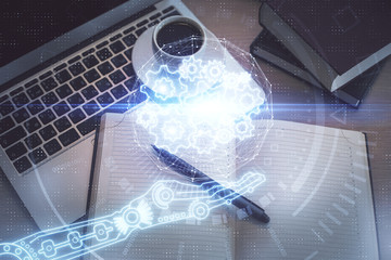 Multi exposure of data theme drawing hologram over topview work desk background with computer. Concept of technology.