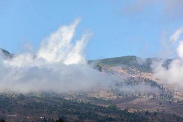 Low clouds over slopes of old volcano, Tenerife, Canary Islands, Spain