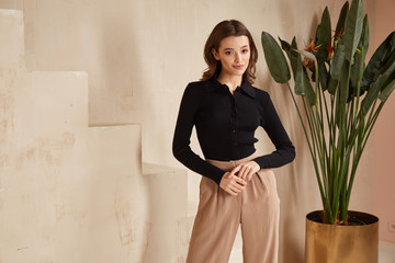 Beautiful brunette woman natural make up wear fashion clothes casual dress code office style black...