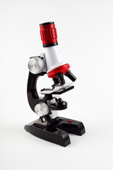 Children's toy microscope on a white background, isolate