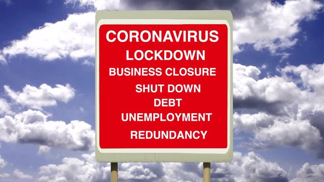 Coronavirus  Covid-19  Sars-CoV-2 virus infection and illness. Business closed lock down sign under a time lapse blue sky with white clouds. Recession debt and unemployment.  Corona covid.