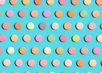 Seamless pattern of pharmaceutical pills or vitamins on a blue background. Multi-colored pills on a blue background.