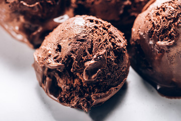 Rich and Indulgent Chocolate Ice Cream Scoops with dark chocolate pieces