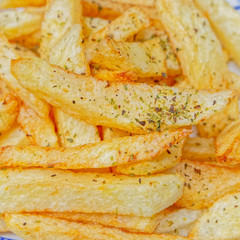 delicious hand cut french fries top view close up, tasty background