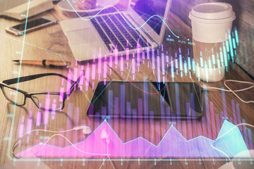 Double exposure of financial graph drawing and cell phone background. Concept of forex trading