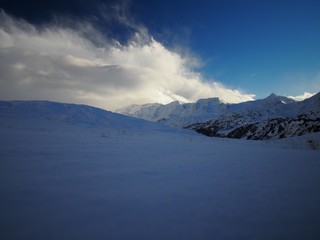 Scenic View Of Mountains Against Sky During Winter