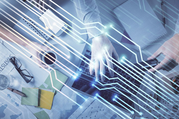 Double exposure of man and woman working together and data theme hologram drawing. Computer background. Top View.