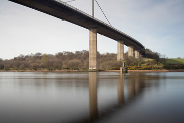Fototapeta na wymiar A view of the Erskine bridge over the river clyde on a spring morning in Scotland.