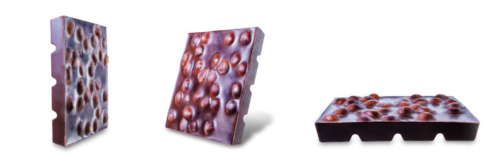 Fototapeta premium Dark chocolate with hazelnuts on a white isolated background