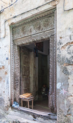 Fototapeta na wymiar open wooden door in Stone Town, Zanzibar