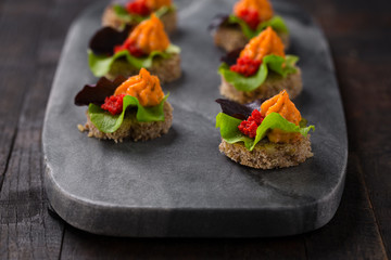 mini catering canapes with caviar