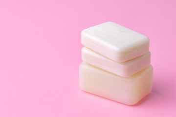 Soap bar isolated on pink background.