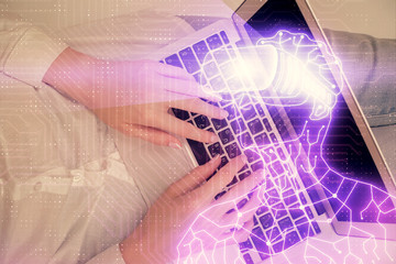 Double exposure of woman hands working on computer and man in ar glasses hologram drawing. Top View. Virtual reality concept.