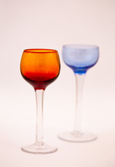 Two glasses - red in focus blue out