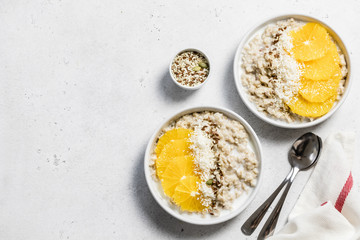 Earl Grey oatmeal with honey broiled orange. Top view, copy space.