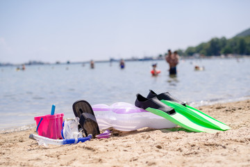 Beach gears on a sand
