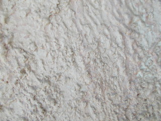 
The surface of the wall of the building. Blurred defocused background for web design.