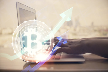 Double exposure of woman hands typing on computer and crypto market theme hologram drawing. Blockchain concept.