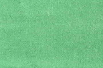 Green linen fabric cotton for wallpaper design. Brown weave cotton background texture.