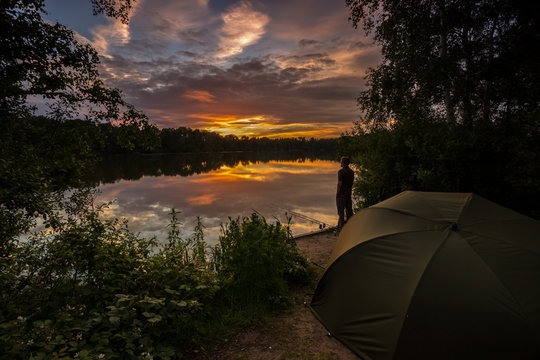 Carp fishing at sunset on a large lake