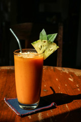 Papaya smoothie in glass