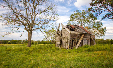 Old broken falling down house