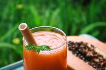 Papaya smoothie in glass