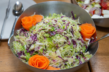 Cabbage salad in bowl close up