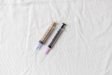 Syringe or Injections, vials on white background