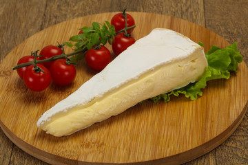 Brie cheese triangle served salad