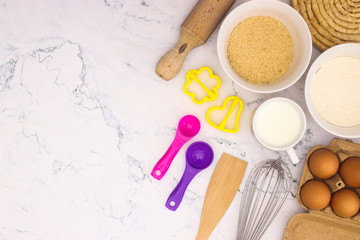 Cooking groceries for baking and making cookies  on the kitchen table