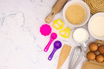 Cooking groceries for baking and making cookies  on the kitchen table