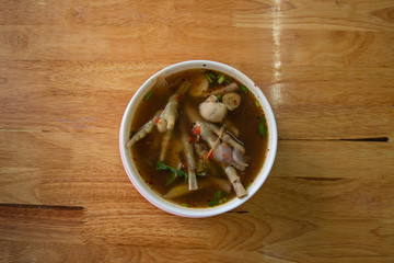 Om Kaeng curry, chicken curry with golden pods Chicken legs, chopper, northeastern Thai food