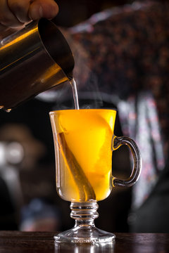 Bartender Preparing Classic Hot Toddy Cocktail